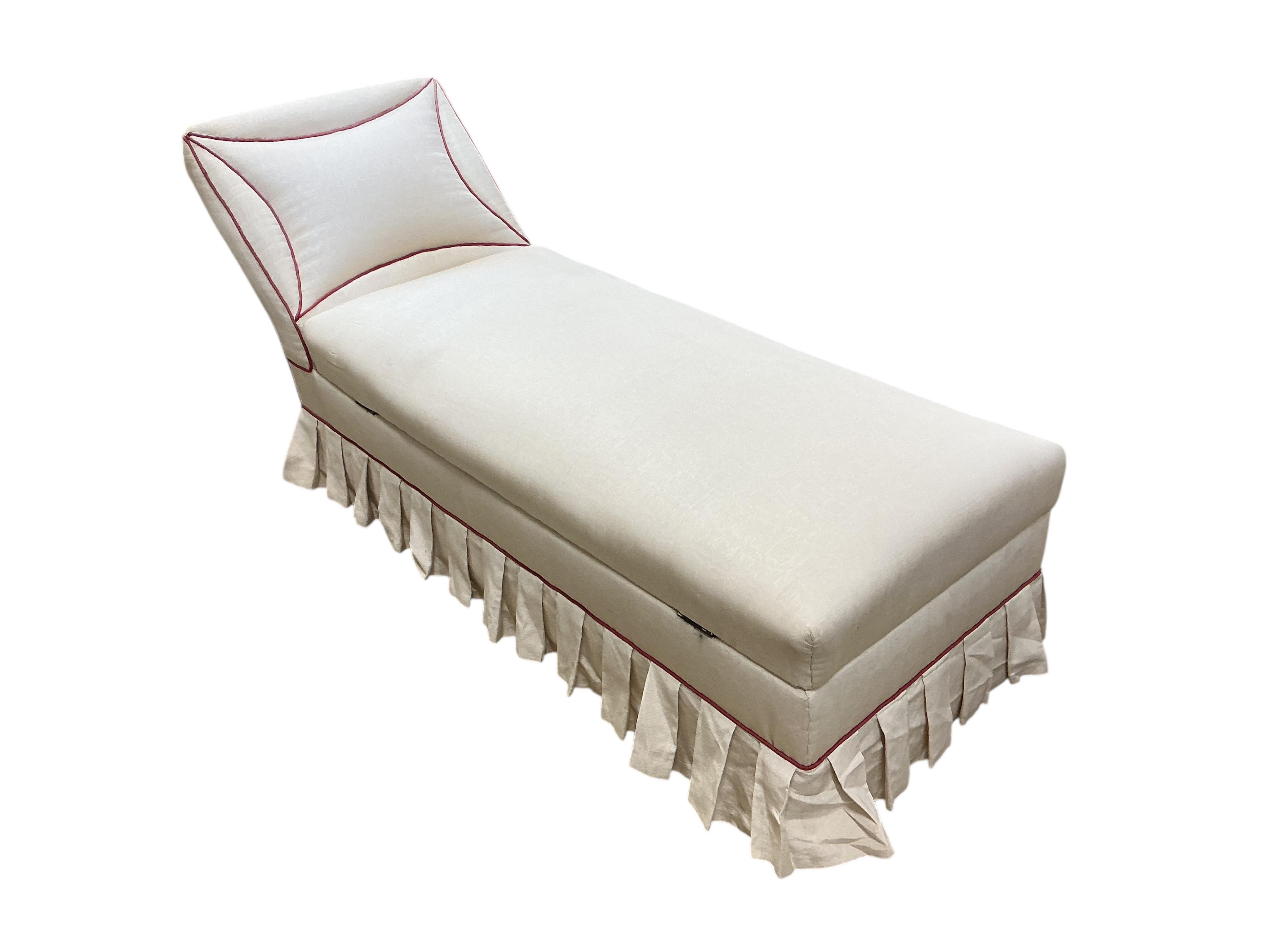 A late Victorian upholstered daybed, with hinged box seat, length 164cm, depth 59cm, height 74cm